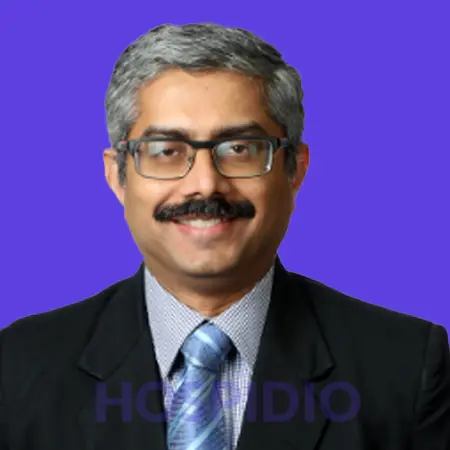 8 Dr. Mohan Menon
