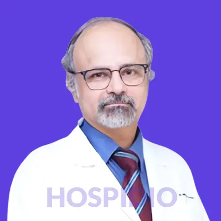 18 Dr. Manmohan Kamat